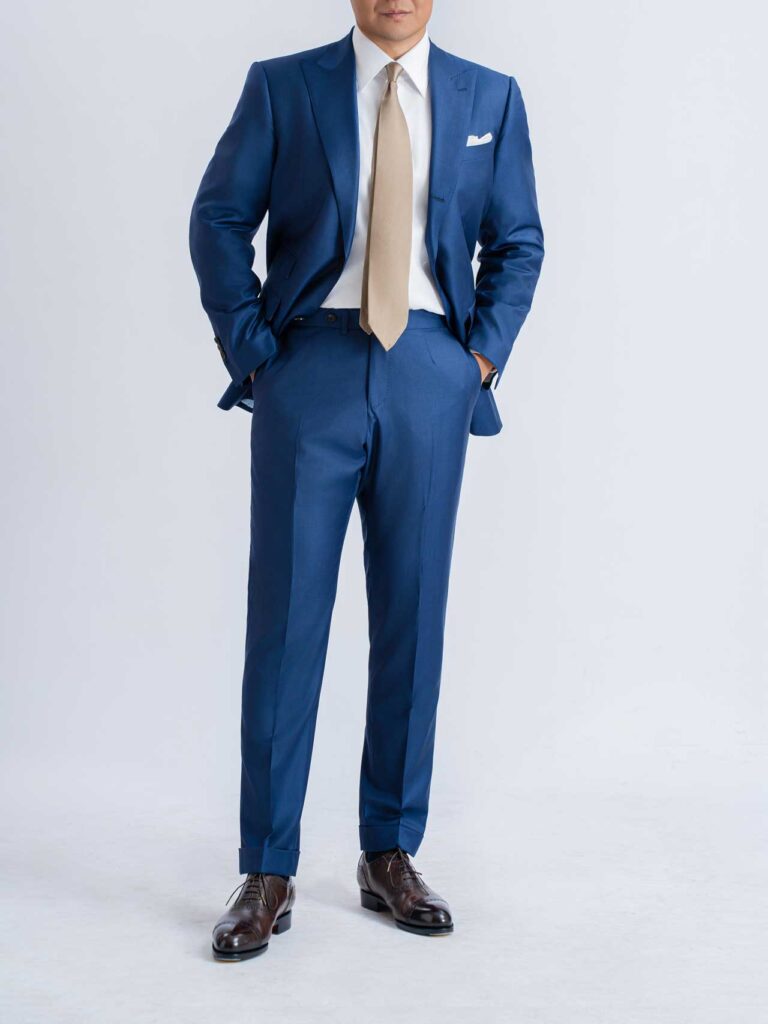 A man in a Royal Blue Suit, Sharkskin Wool, Super 150's Loro Piana suit.