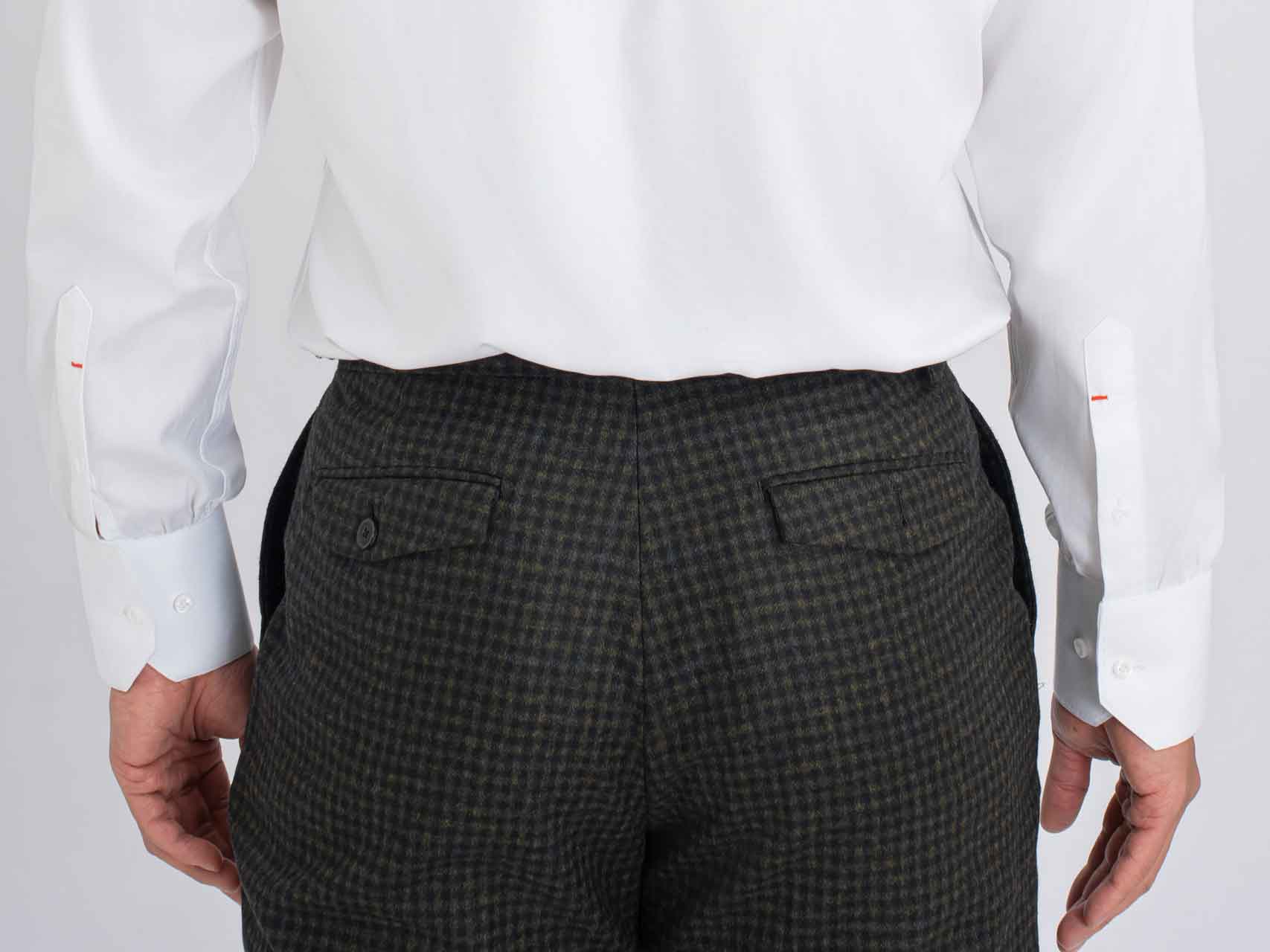 The back view of a man wearing a white shirt and black pants, sporting a Light Blue Stripes Suit, Australian Super 150's Wool.