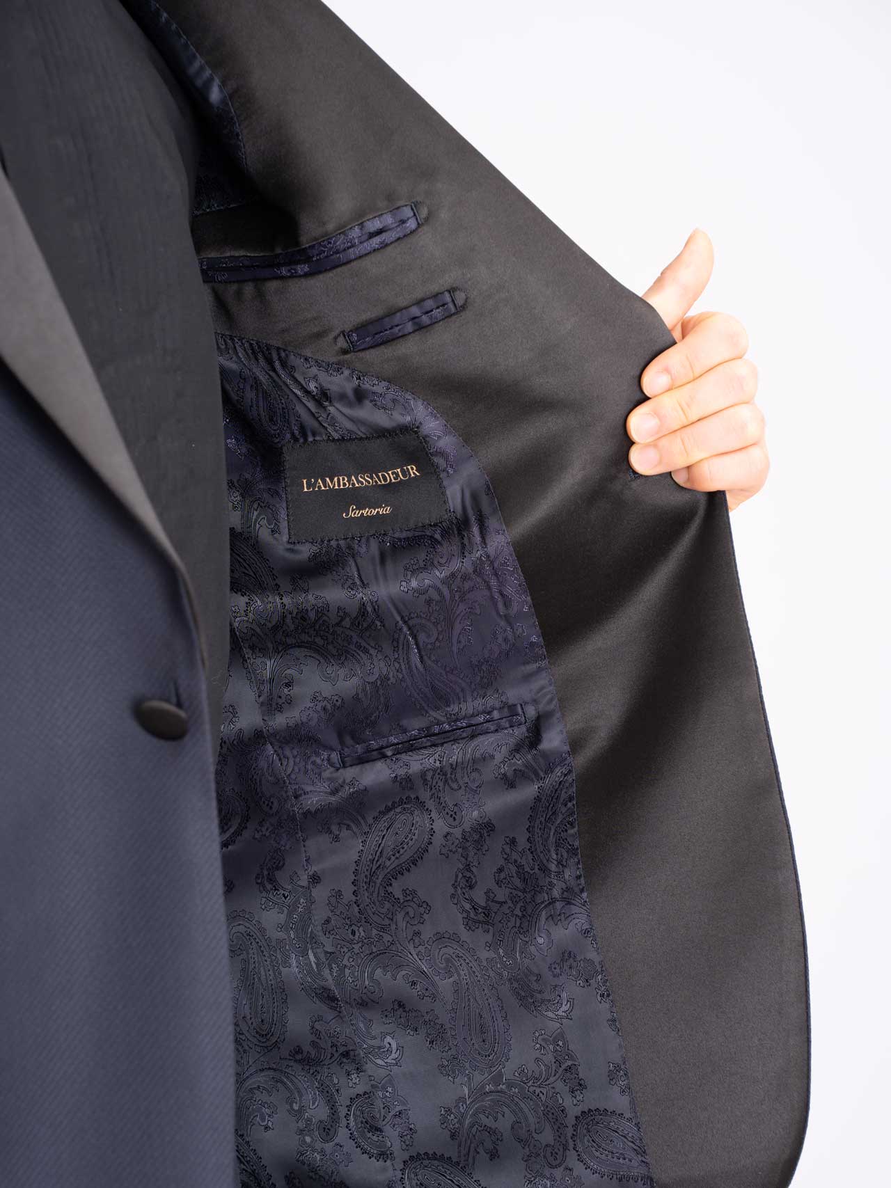 The back of a man's Midnight blue tuxedo jacket, Australian Wool/Polyester.