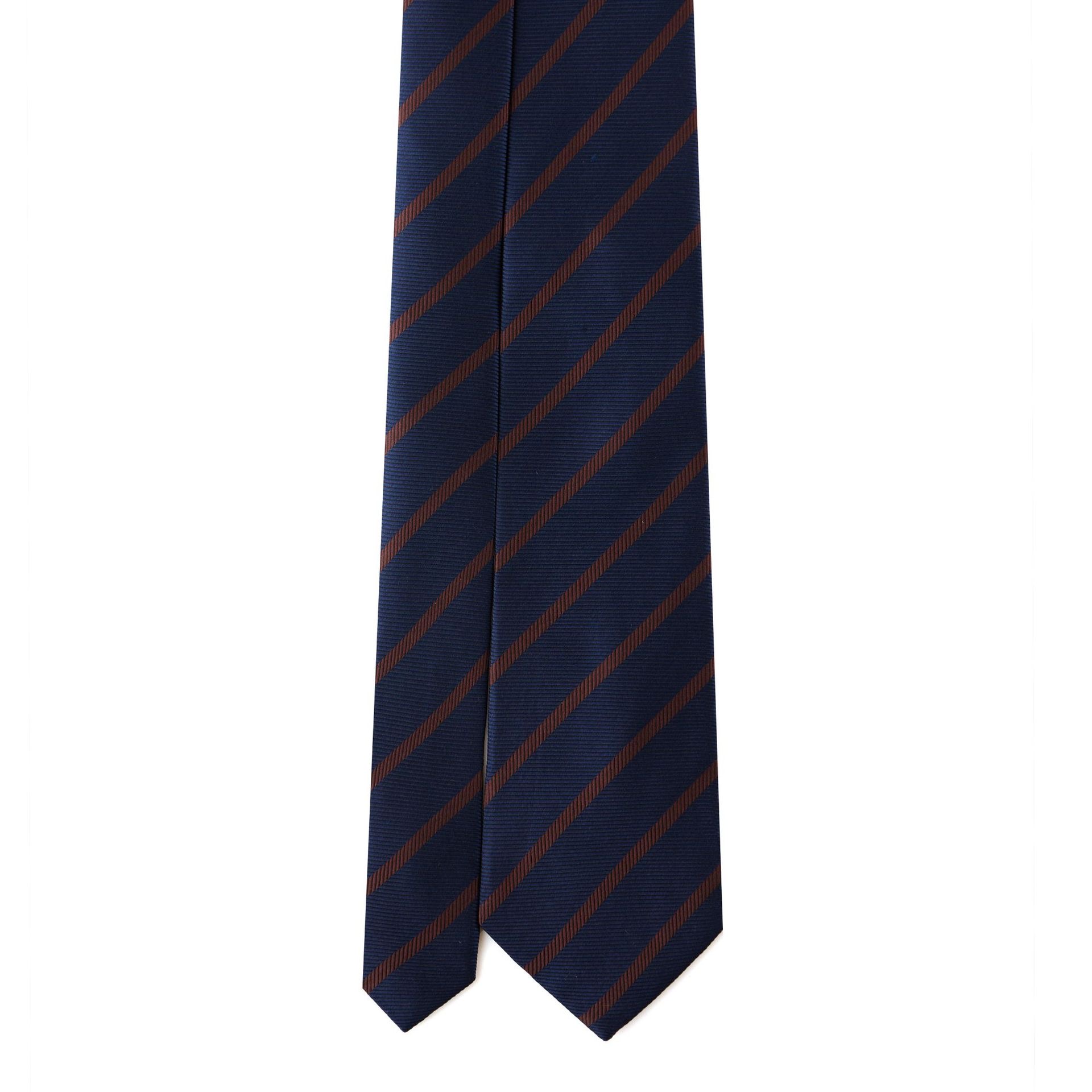 Striped blue and red necktie on a white background.