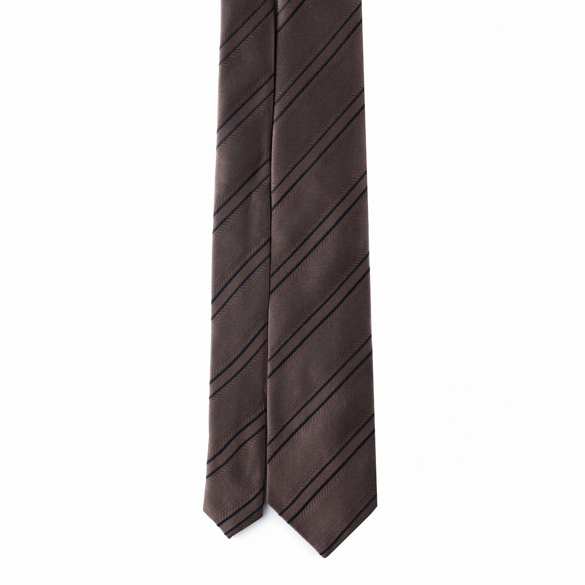 A brown striped necktie isolated on a white background.