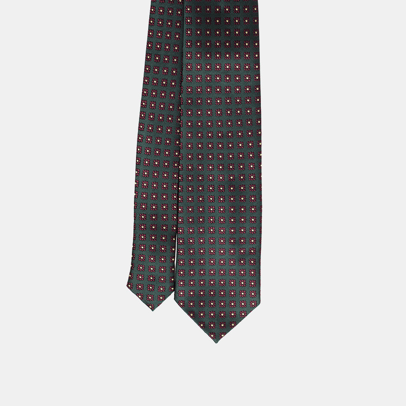 A patterned necktie isolated on a white background.