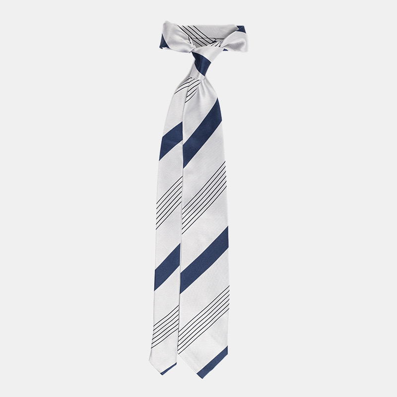 A diagonally striped navy blue and white tie isolated on a white background.