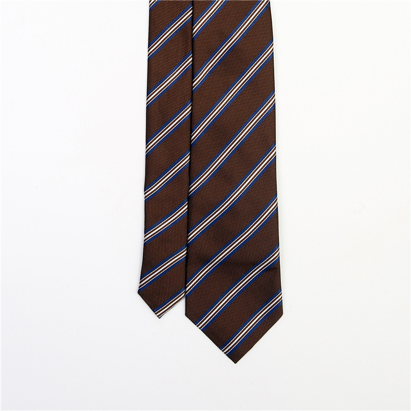 A brown tie with white and blue diagonal stripes against a white background.