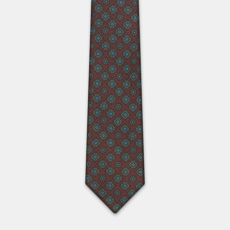 Silk tie, n°137 with geometric design on a white ceremony shirt.