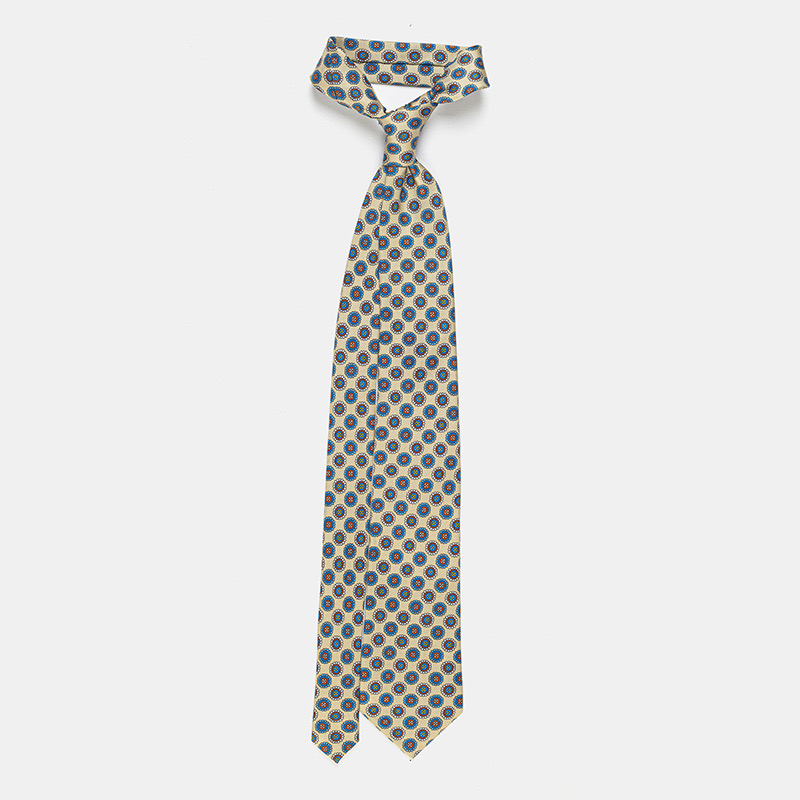 Silk tie, blue with flower n°137 with blue and gold design on a white background, ideal for a white ceremony shirt.