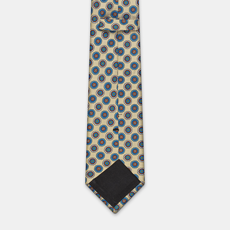 Silk tie, blue with flower n°137 on a white ceremony shirt.