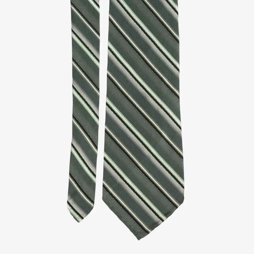 The Abstract Medallions Silk Tie in olive green showcases a sophisticated pattern of diagonal white, light green, and dark gray stripes, set against a plain white background.