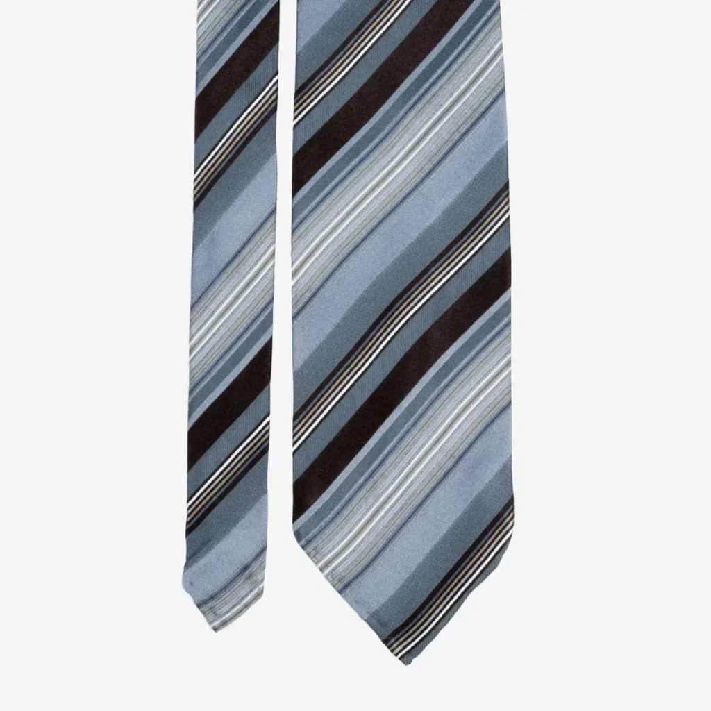 A close-up of the Abstract Medallions silk tie in olive green, featuring an intricate pattern, displayed on a white background.