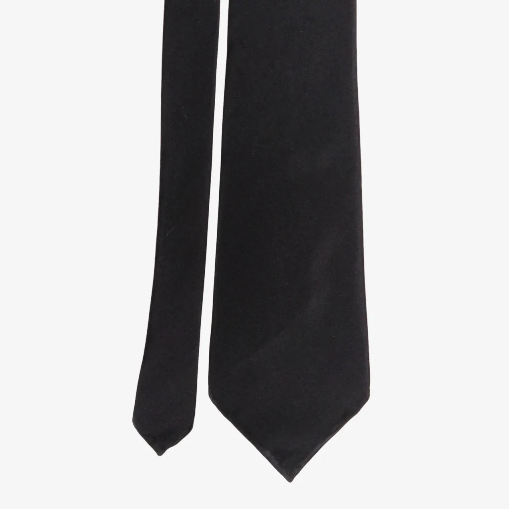 A close-up view of the Diagonal Stripe Silk Tie in forest green, featuring a pointed tip, shown against a plain white background.